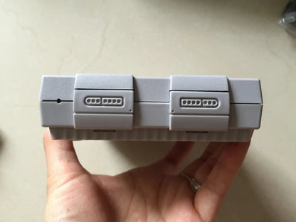 Nouvelle sortie Super HD pour lecteur de jeux vidéo portable rétro classique SNES Mini console de jeux TV 21 jeux intégrés avec double manette
