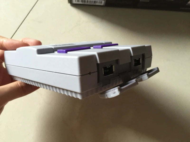 Nouvelle sortie Super HD pour lecteur de jeux vidéo portable rétro classique SNES Mini console de jeux TV 21 jeux intégrés avec double manette
