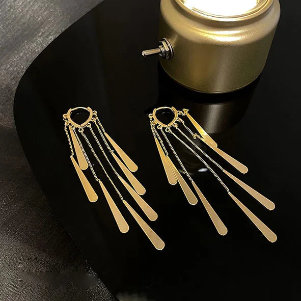 Boucles d'oreilles élégantes et délicates pour femmes, design unique, tendance 2023