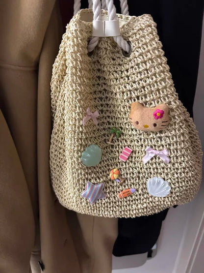 Sac à dos de plage Sanrio Hello Kitty, mignon, tissé à la main, grande capacité, en paille, style bohème, pour les vacances, les voyages, pour fille, cadeau d'anniversaire
